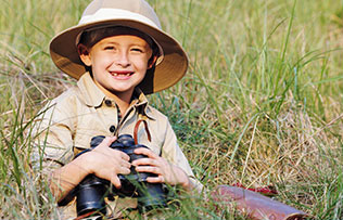 Mostly decorative pic, kid wearing safari clothes.